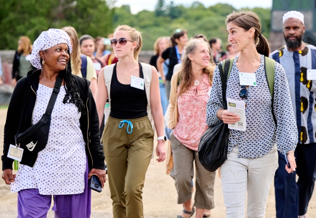 A group of non-formal educators gather outdoors at Shelburne Farms
