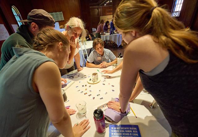 Educators gathered around a table