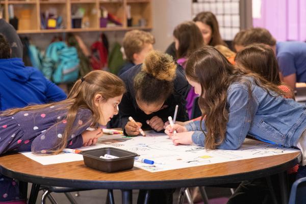 Willston Central School students working on a community map inspired by the UN's Sustainable Development Goals.