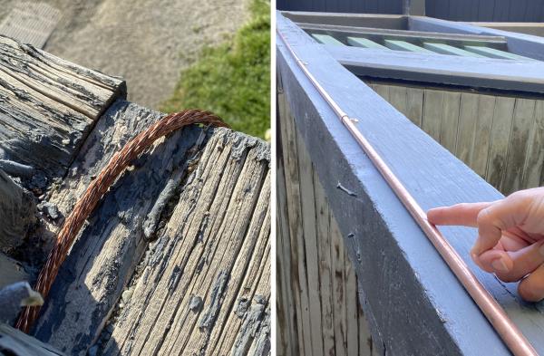 copper cable running along beams of the exterior of the Farm Barn