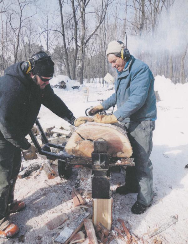 Marshall splitting wood