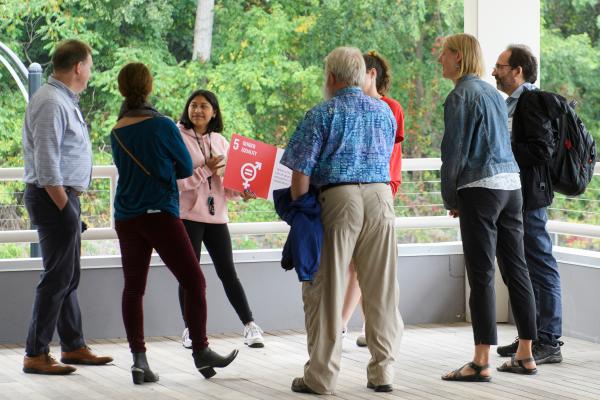 Burlington High School Students talks with RCE representatives at sailing center.