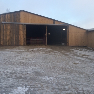 New doors and repairs on the sheep barn.