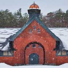 The Shelburne Farms Coach Barn in the snow